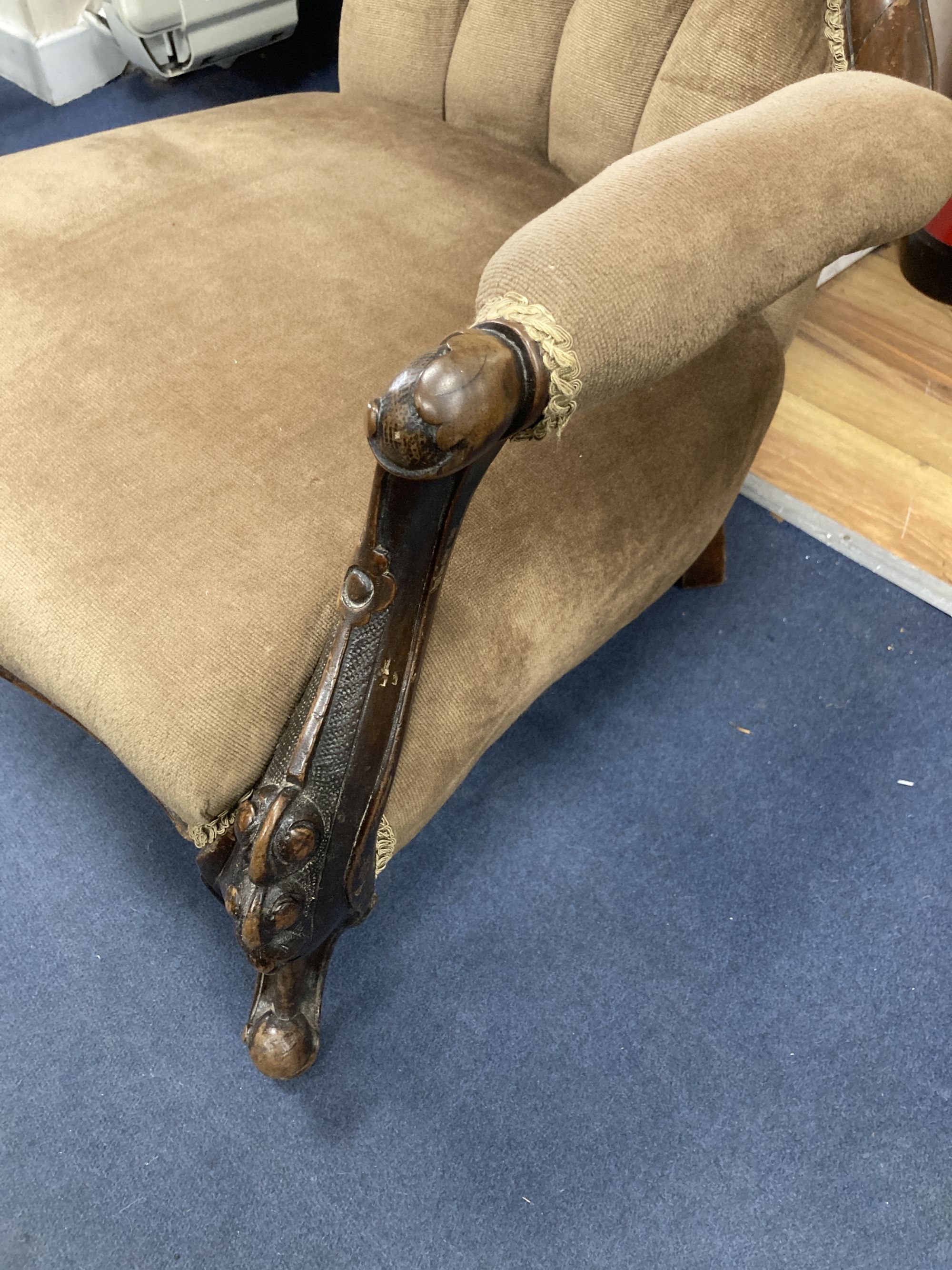 A Victorian walnut spoon back open elbow chair, width 70cm, depth 70cm, height 96cm